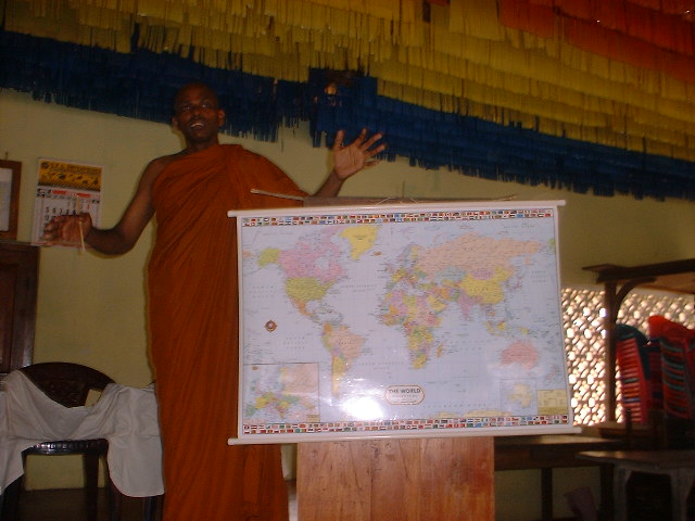 Delivering a lecture about Buddhism in Africa at Baddegama temple on 03 June 2006.JPG